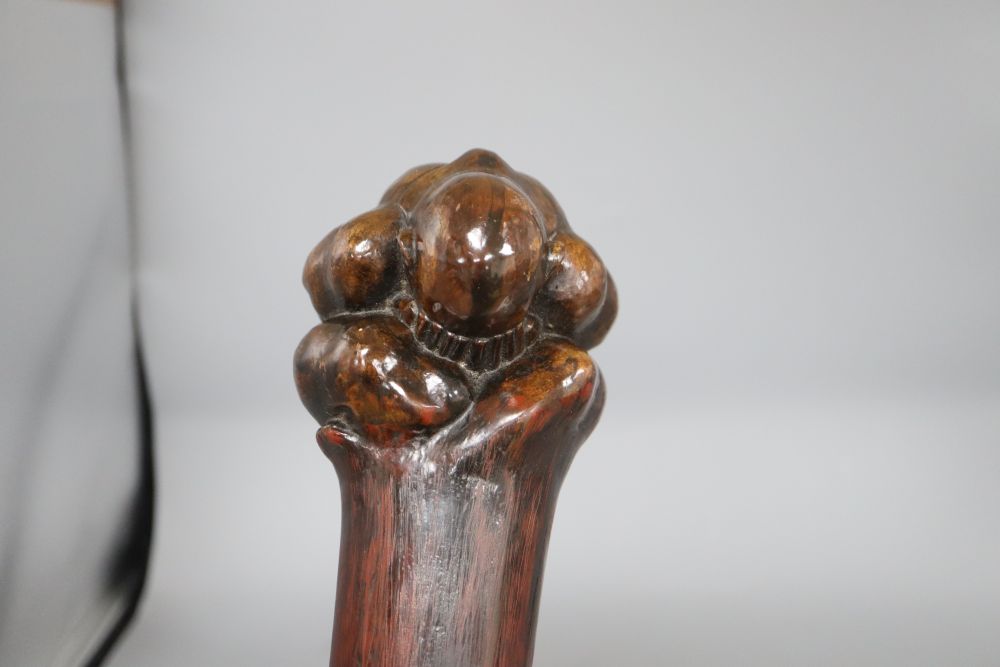 A kneeling man knobkerrie, with bone mounted handle, length 60cm